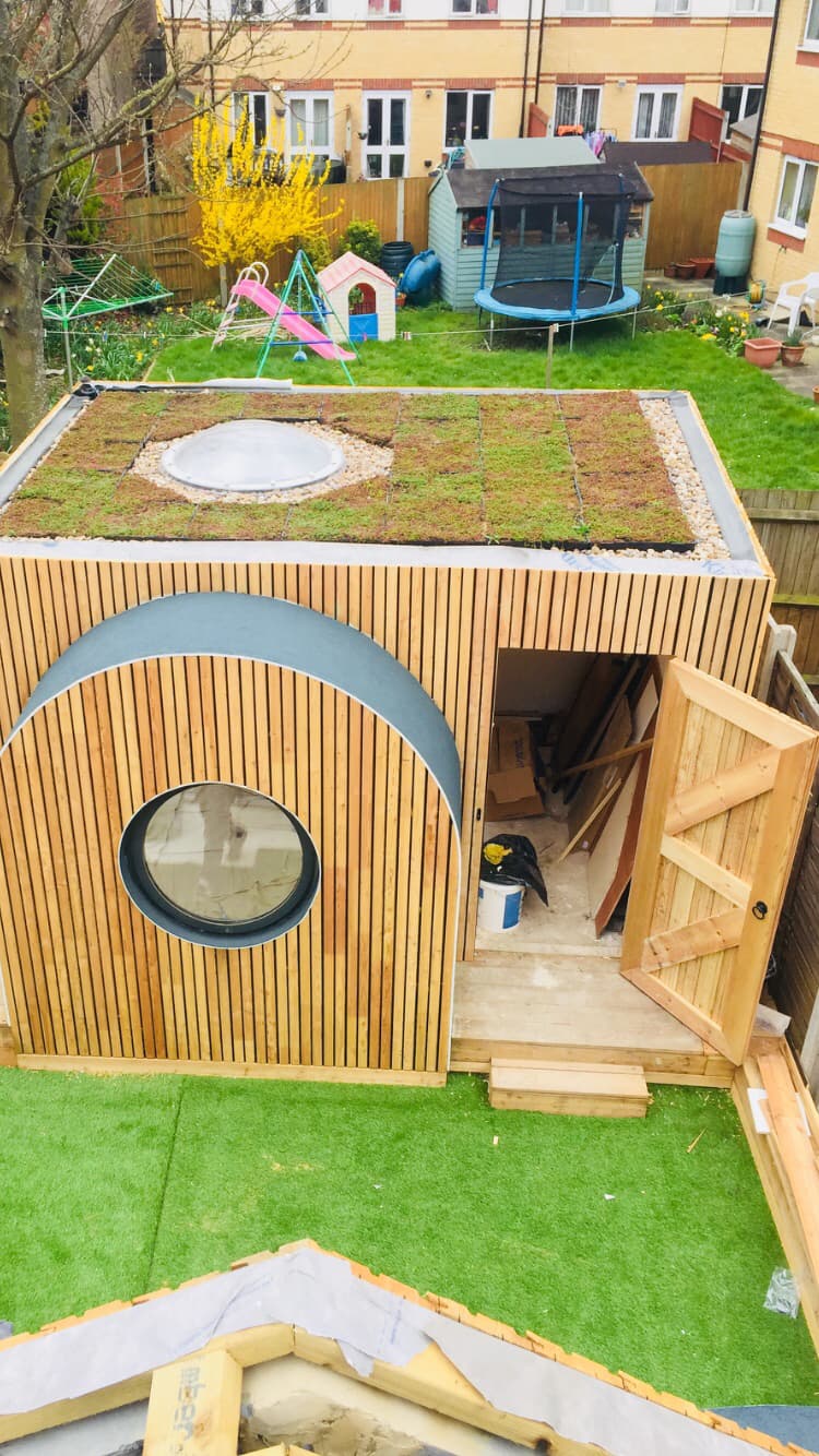 Custom timber garden room with green roof - Bespoke building projects Surrey
