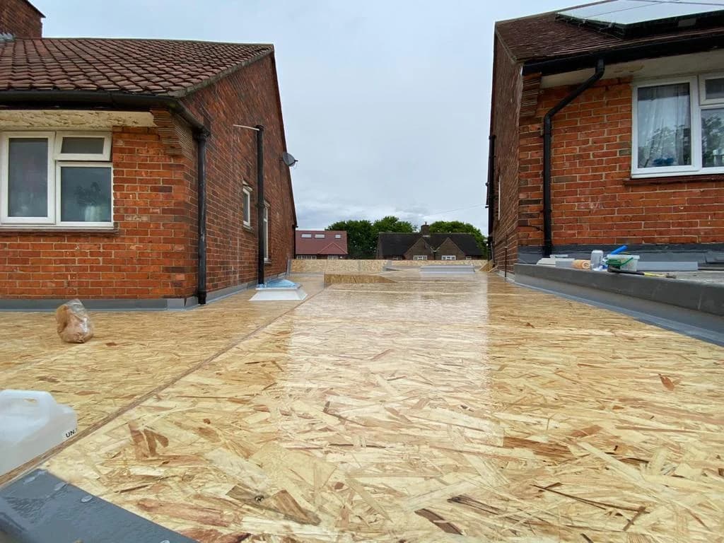 Flat roof extension construction in progress - Building contractors London